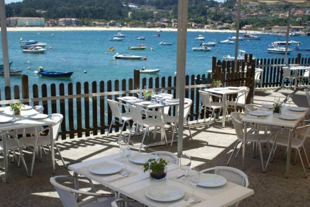 Primera Linea De Playa Rias Baixas, Moana Apartment Luaran gambar