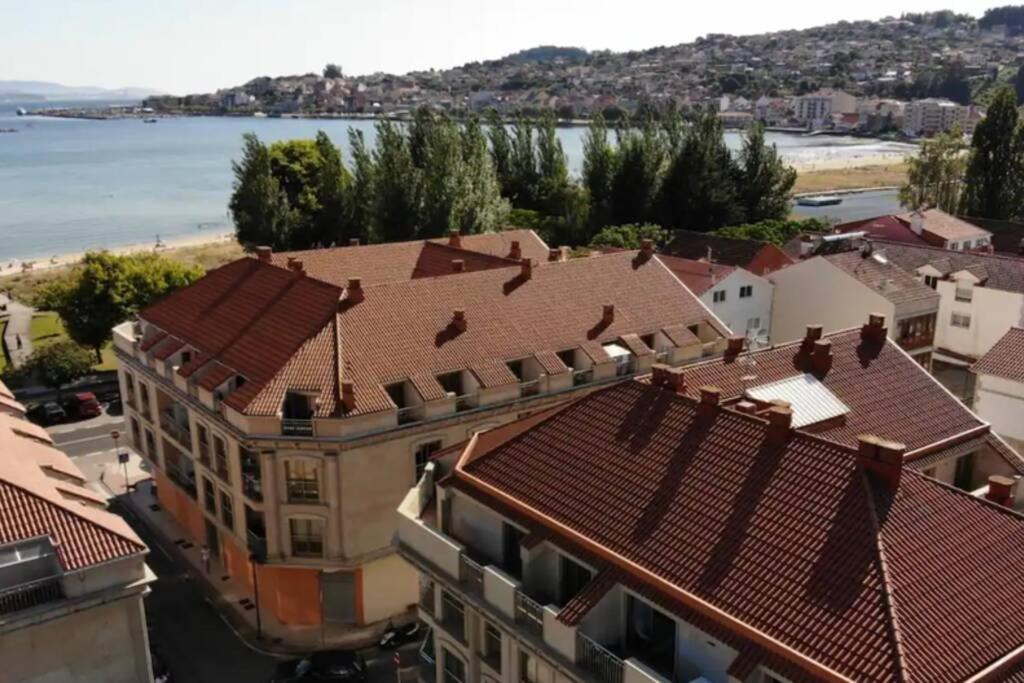 Primera Linea De Playa Rias Baixas, Moana Apartment Luaran gambar