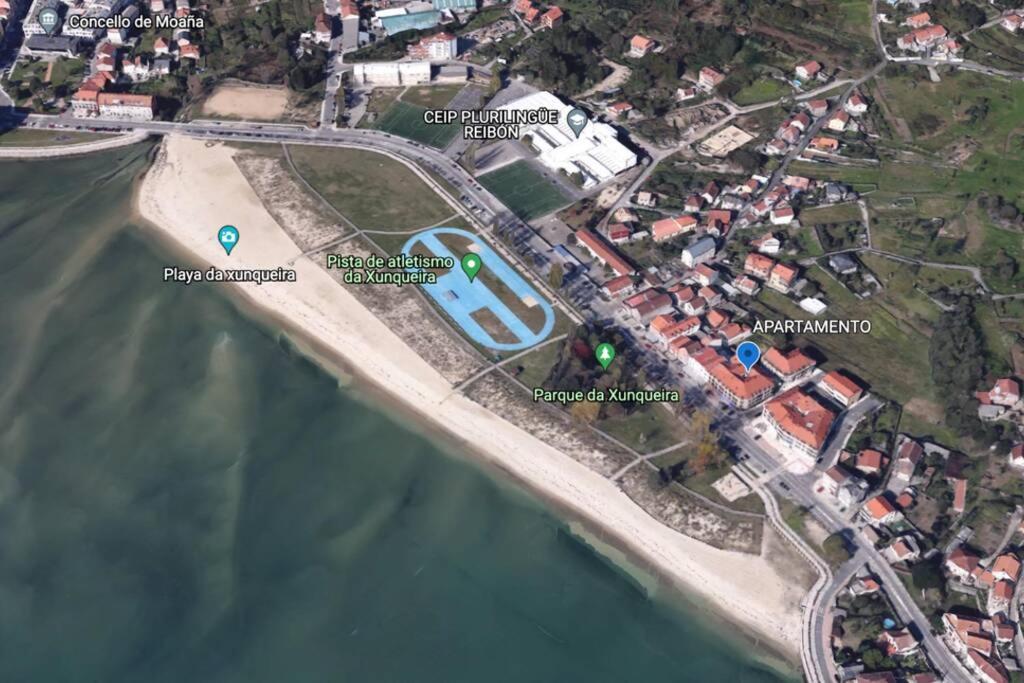 Primera Linea De Playa Rias Baixas, Moana Apartment Luaran gambar